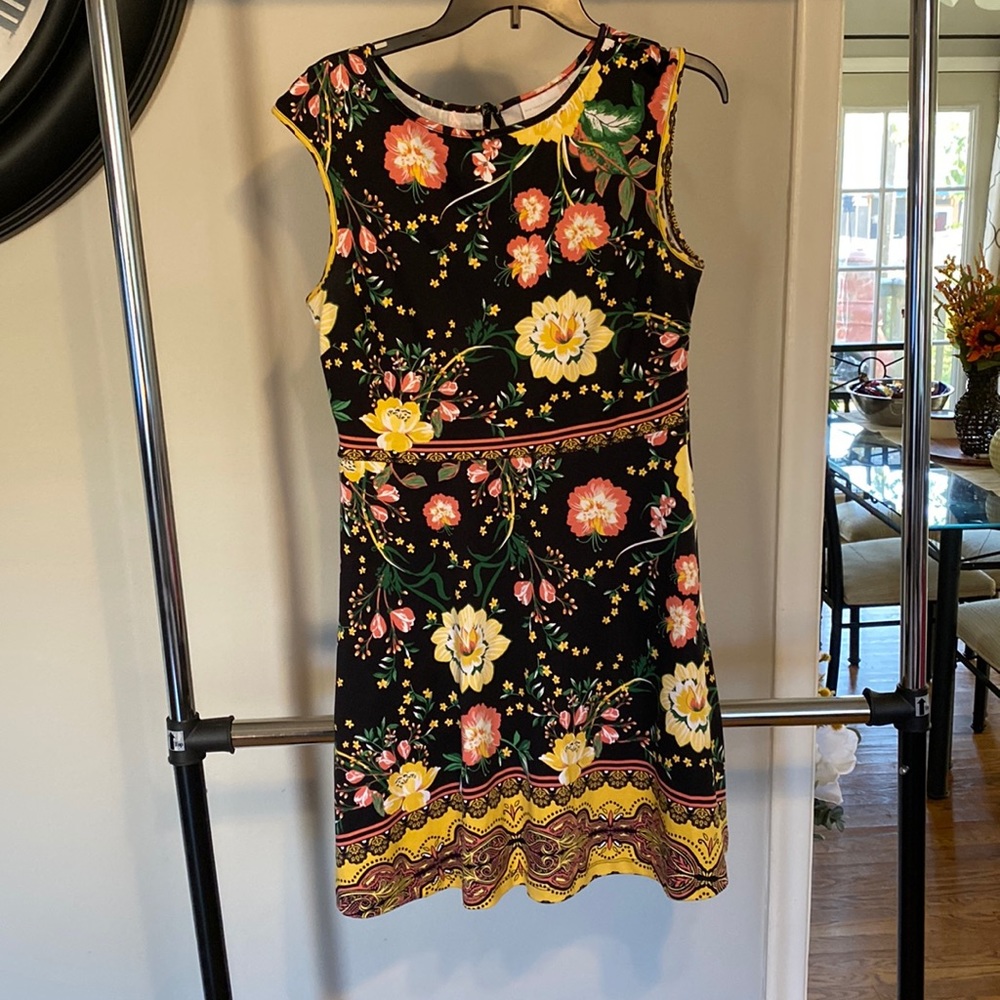 Tank style dress. Black background with flowers.